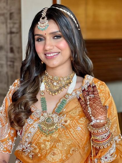 A final portrait of the bride. The makeup is designed to look beautiful from every angle, ensuring she is picture-perfect on her big day.