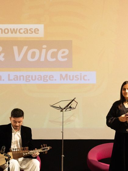 A poetry performance accompanied by an Afghan rubab player at our showcase. The workshop explored the fusion of different languages, rhythms, and music.