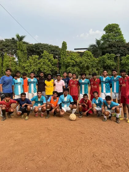 Both teams posing together after a competitive practice match, highlighting the sportsmanship and respect in youth football.