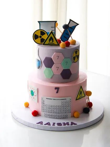 The full view of the science cake for Aaisha, combining learning and fun in a sweet creation.
