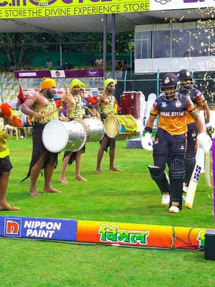 Drummers create a vibrant atmosphere for a player's entrance at the Karnataka Premier League (KPL). We incorporate local culture and high-energy entertainment into our regional league productions.