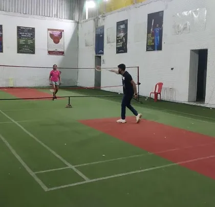 A player covering the court during a singles rally. Singles is a great test of your fitness and court coverage skills.