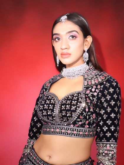 A final portrait of this modern and chic party look, perfect for any glamorous evening event.