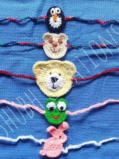 Perfect for little ones, these eco-friendly and reusable crochet rakhis are designed as cute animals like a penguin, bear, lion, frog, and bunny.