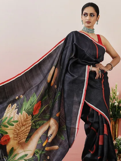 Another view of the swan-printed saree, highlighting its artistic and elegant appeal.