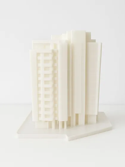 This monochromatic study model helps us analyze the massing and rhythm of a facade. It makes abstract concepts tangible and creates a focal point for collaborative discussion and refinement within the team.