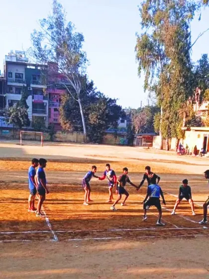 A wide view of a practice match on our ground. This is where skills are tested and strategies are refined every single day.