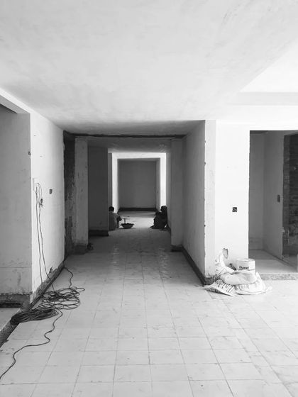 An interior view after the initial civil work is done. The open spaces and clear sightlines are already evident, promising a minimal and light-filled home.