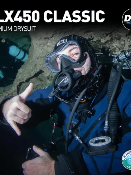 A diver explores a cave system, fully equipped with our DUI CLX450 Classic premium drysuit. This gear is built for the most demanding underwater environments, providing unmatched durability and thermal protection for technical and cold-water exploration.