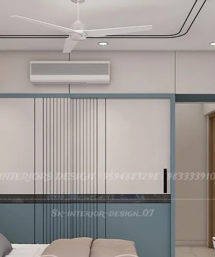 A bedroom design showing a wardrobe with interesting vertical and horizontal grooves. The color blocking with light blue and white adds a playful, modern touch.