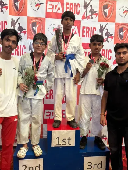 The result of dedication and hard work. I am proud to stand with my students on the winners' podium as they celebrate their achievements at a Taekwondo competition.