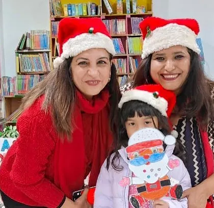 A happy family moment captured during our Christmas celebration. These events are designed to bring parents and children together for a shared creative experience.