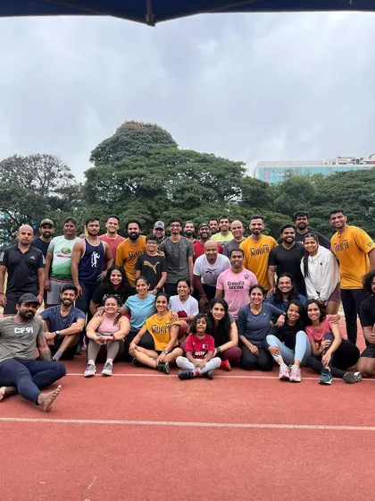 Our running community is strong. This is a shot of our group after a tough track workout. We believe in being stronger together, pushing each other to be better humans, not just better runners.
