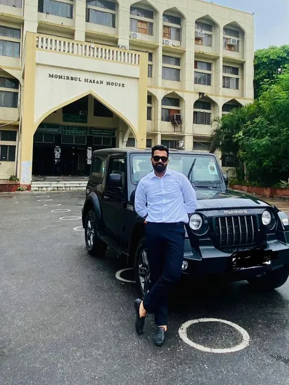 Standing with my Mahindra Thar outside the Monisbul Hasan House. My vehicle is a trusted companion on my many journeys across the region.