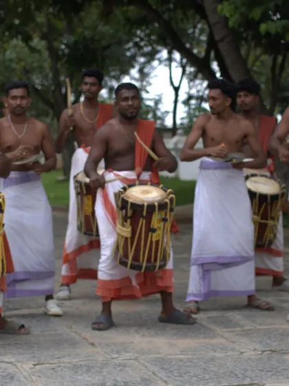 The powerful rhythm of the 'Chenda Melam' (traditional percussion ensemble) fills the air during our Onam festivities. The sound is invigorating and central to Kerala's cultural celebrations.