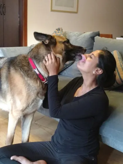 Jedi giving me kisses. The relationships I build with my clients and their dogs are truly special and are an integral part of my life.
