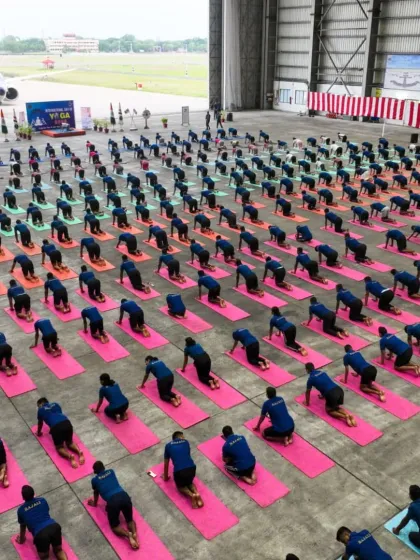 A large group of naval personnel practicing a variation of Vajrasana. The uniformity and dedication on display are truly commendable.