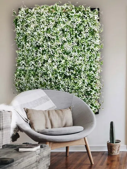 A simple yet elegant way to bring nature indoors without any fuss. This beautiful white floral artificial garden panel creates a perfect, calming reading nook.