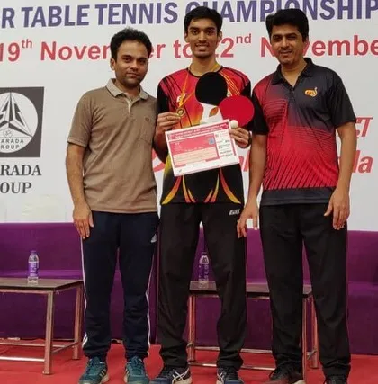 Deepit Patil with his coaches after winning the Maharashtra State Championship, a testament to the teamwork and dedication behind the victory.