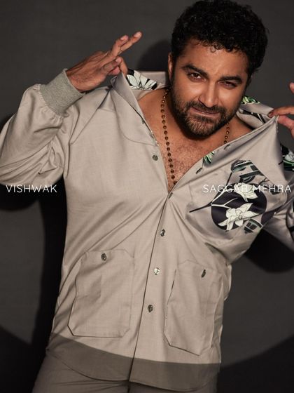 Vishwak Sen serving looks in our Ethereal Suit. This bespoke masterpiece features a unique cross pattern and is paired with straight accent pants.