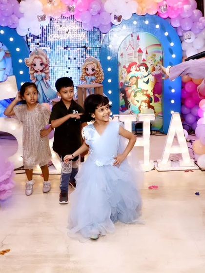 The birthday girl and her friends dancing with the party host, a great example of the fun activities we can organize.