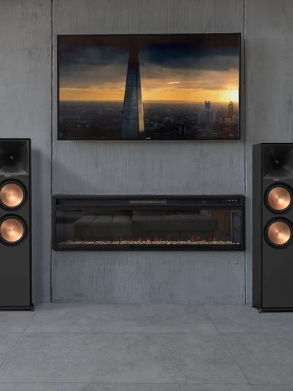 This Klipsch Reference series setup with its signature copper-spun woofers makes a bold statement. The floorstanding speakers provide a powerful, dynamic sound that is ideal for both movies and music in a larger living area.