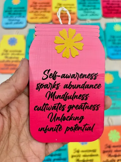 This pink jar-shaped hanging with a motivational quote was part of a custom Diwali gifting order. It's a great piece for an office desk.