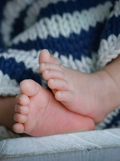 I am obsessed with all the tiny details. These perfect little feet, so small they fit in the palm of your hand, are the details I want you to remember long after they've grown.