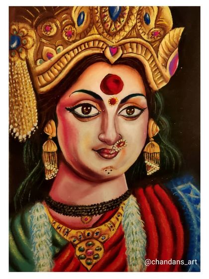 A colourful rangoli portrait of Devi Maa, created for the Navratri festival. The artwork focuses on her serene yet powerful expression, adorned with a detailed crown and jewelry, perfect for Dussehra celebrations.