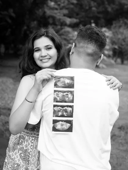 A creative announcement shot featuring the sonogram pictures. The black and white treatment gives this outdoor portrait a timeless and classic feel.