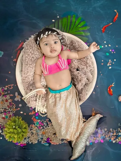 A full view of the mermaid setup, complete with sparkling treasures and sea life. Every detail is crafted to build a magical world for your baby.