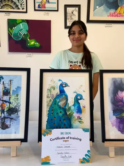 This student's watercolor paintings are simply breathtaking. She has beautifully captured the delicate nature of the medium in her peacock and lotus artworks.