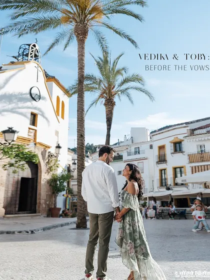 Before the vows in Marbella, Spain. We styled this couple for a romantic walk through the old town, choosing a breezy floral dress for her and a simple white shirt and trousers for him to complement the idyllic, sun-drenched setting.