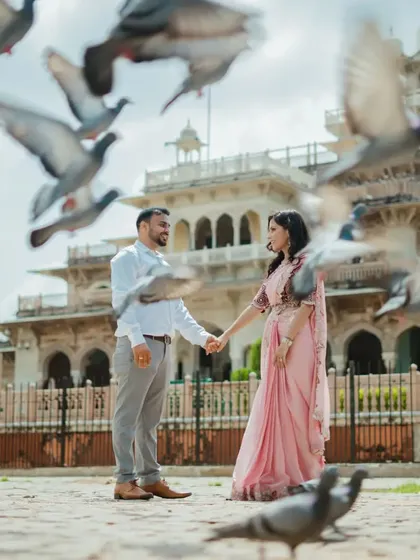 A pre-wedding shoot should be fun, not just a series of poses. This shot at Albert Hall, with pigeons taking flight, is full of life and energy. It’s a perfect example of how I capture candid, joyful moments.