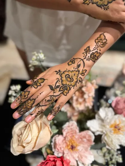 A close-up showing the details of the floral vine design.