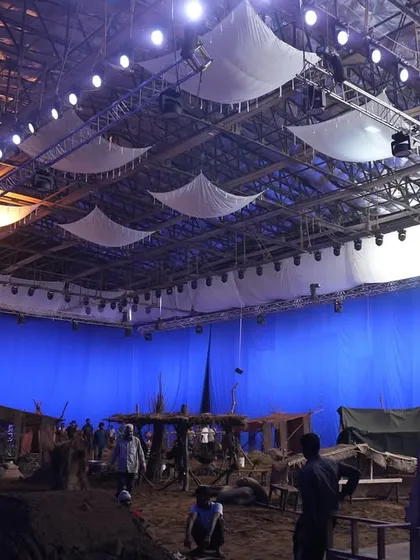 A wide shot of the blue screen set for the song 'Uyi Amma' from the movie 'Azad'. This shows the initial phase of lighting a large VFX scene.