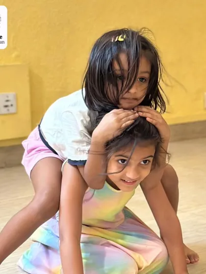 Playful collaboration during a summer workshop. These moments of fun and connection are what make the experience memorable.