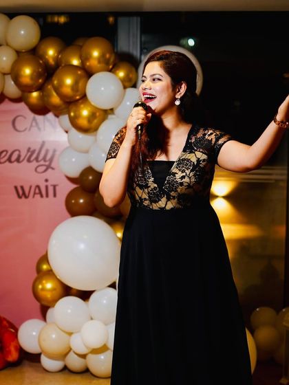 On stage at a 'We Can Bearly Wait' themed baby shower. The decor was adorable, and the atmosphere was full of love and anticipation.