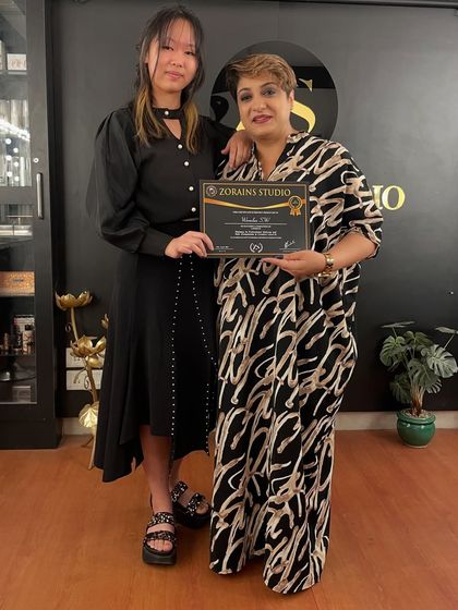 Another successful student graduates from Zorain's Studio.