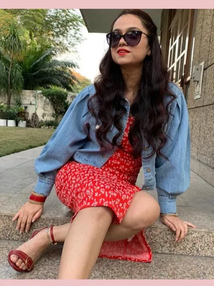 A denim jacket is the ultimate layering piece. Here, I've thrown a puff-sleeve denim jacket over a red floral dress to make it more casual and add a bit of warmth for a cooler day.