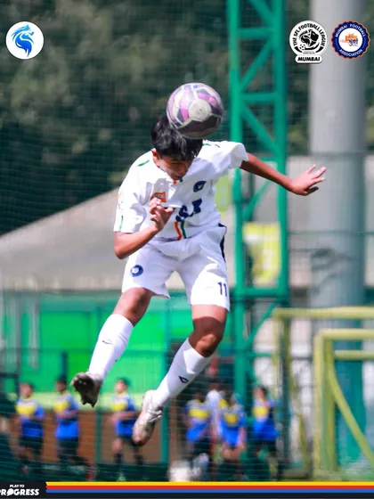 A player rises high to win a header. Aerial ability is a crucial skill we develop in our athletes.