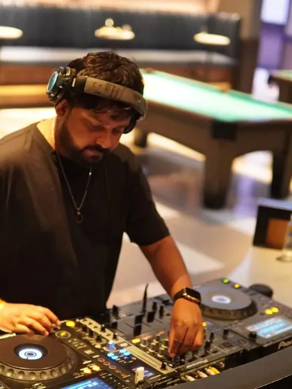 Mixing tracks in the elegant lounge at DLF Camellias. This venue has a great vibe, perfect for blending different genres like R&B, hip-hop, and house music.