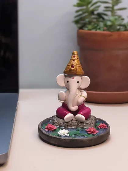 Placed beside a plant, this miniature Ganesha creates a small, sacred corner in any room. It’s a reminder of peace and new beginnings.
