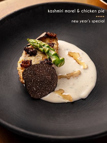 From our New Year's special menu, this Kashmiri morel and chicken pie is served with a rich walnut cream and shaved truffle. It's an indulgent dish to celebrate a special occasion.