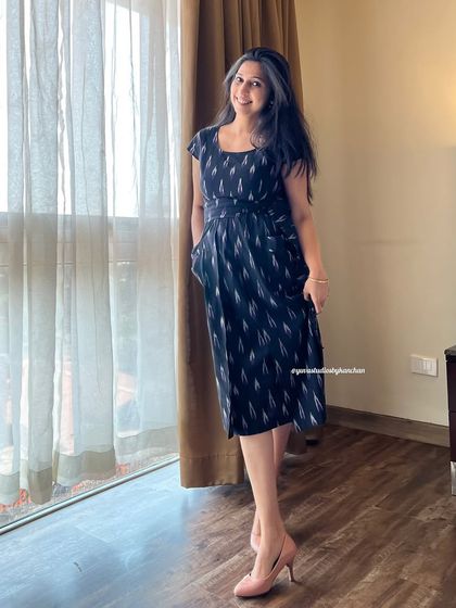 This black Ikat pinafore dress is a perfect example of versatile styling. It’s elegant, features our signature pockets, and can be dressed up or down for any occasion.