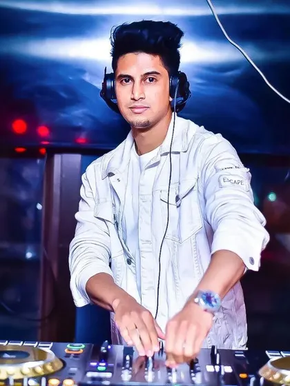 In my all-white outfit, mixing tracks for another Monday Madness. The vibe is always fresh and energetic.
