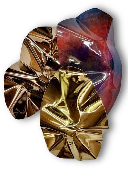 "Meteor 69" is a composite piece, combining polished gold-toned steel with a richly colored, textured element for a striking contrast.