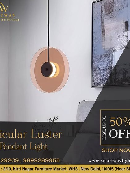 The Acicular Luster Pendant Light features a colored glass disc that creates a beautiful, soft glow. It's a modern and artistic piece, perfect for adding a pop of color.