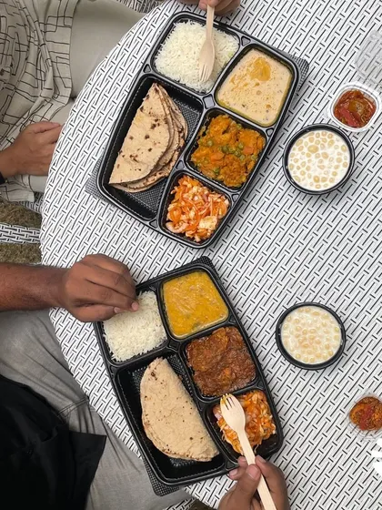 There's nothing better than sharing a meal with someone you care about. Here are two of my meal thalis, one veg and one non-veg, being enjoyed together. This is the happiness I want to deliver to your home. 🏡