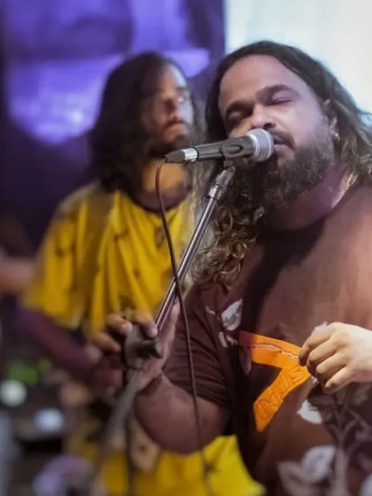 Our frontman pouring his soul into the microphone. Whether it's a high-energy rock anthem or a soulful melody, we deliver every note with passion.
